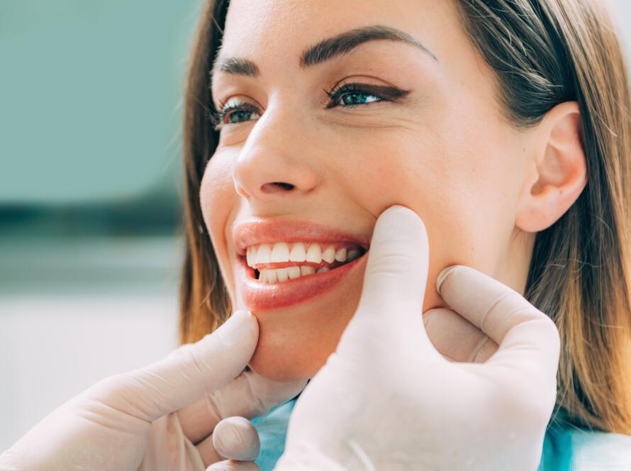 Dentist with beautiful female patient